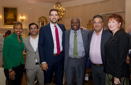 Mason Enterprise team with GMU President Gregory Washington