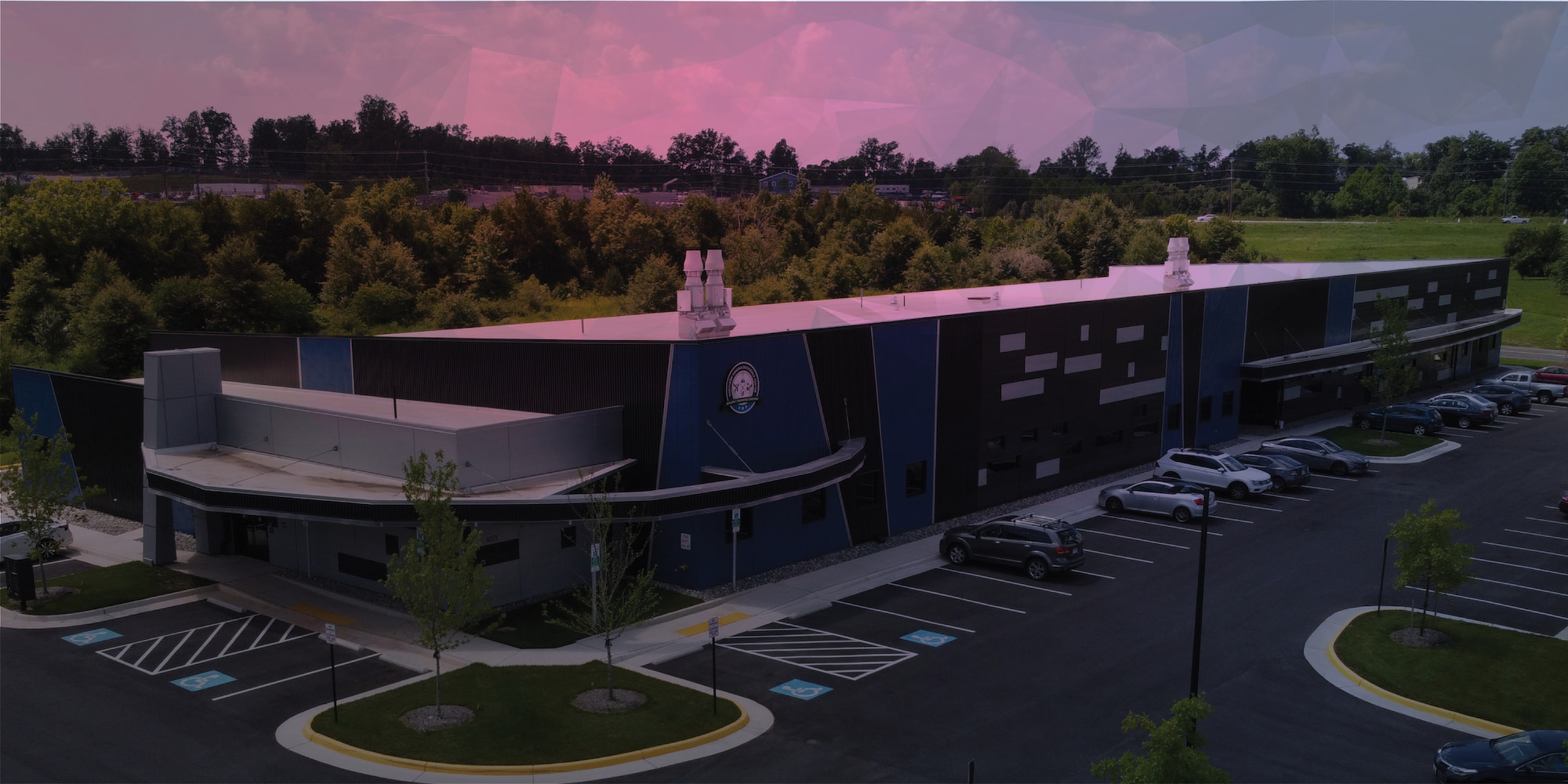 The NOVA Bioscience Center from above with a pink tint. 